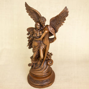 Cupid Psyche bronze sculpture face and wing detail close up copper patina craftsmanship