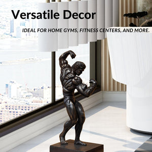 Dark bronze bodybuilder sculpture as versatile luxury décor for home, office and gym settings