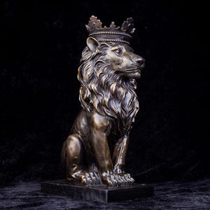 Back angle view of dark bronze crowned Lion King sovereign sculpture on black background