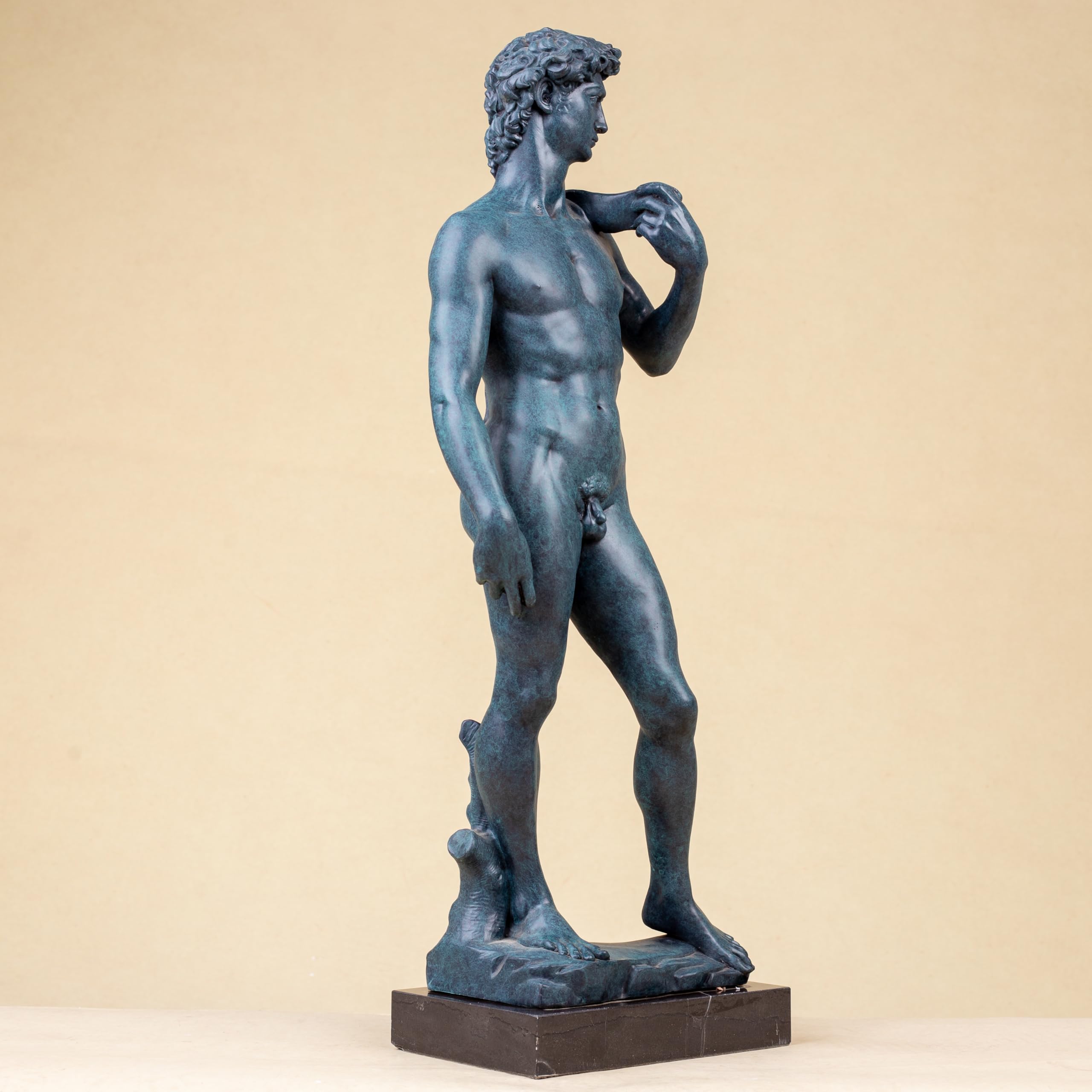 Michelangelo David modern bronze statue full front view on beige background with marble base