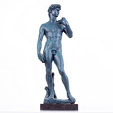 David modern sculpture in matte black finish, front view on marble base