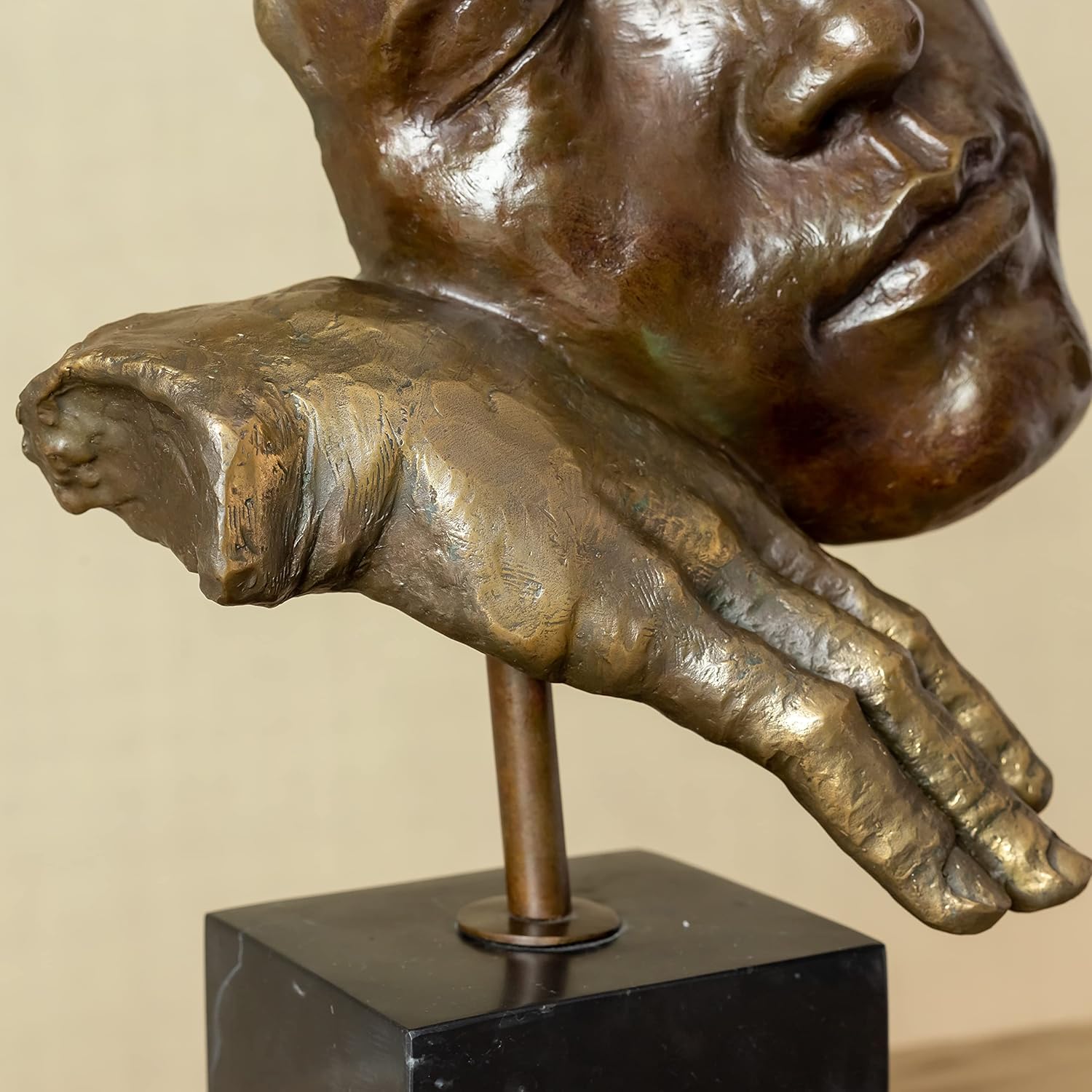 Close-up of abstract bronze face detail on Deep Reflection thinker meditator sculpture