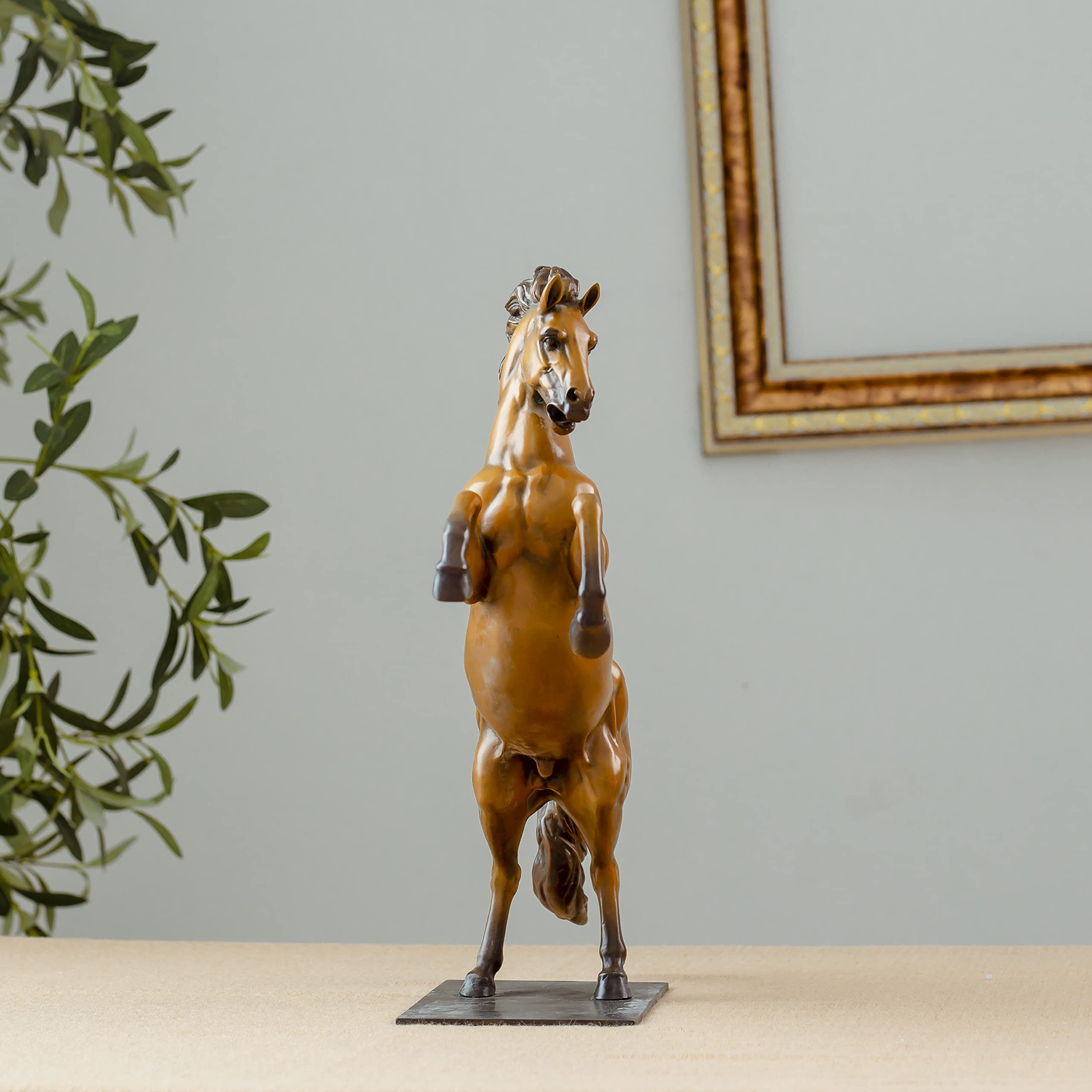 Gold bronze rearing stallion desk edition sculpture front view with greenery decor