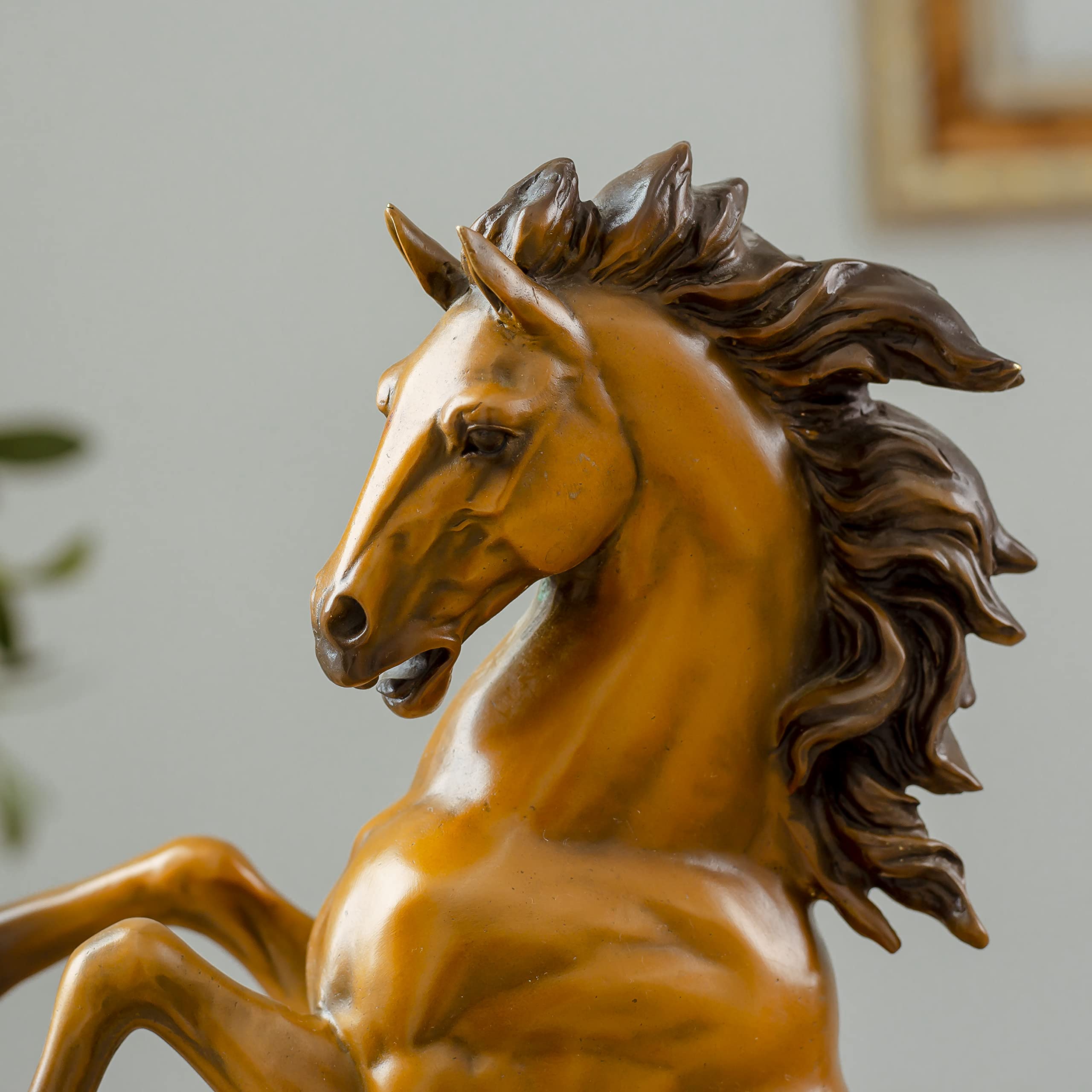 Close-up detail of gold bronze rearing stallion desk edition sculpture head and mane