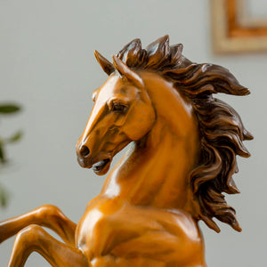 Close-up detail of gold bronze rearing stallion desk edition sculpture head and mane