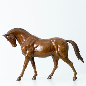 22-inch European Andalusian horse bronze sculpture in dark brown finish, walking stallion side front view on white background