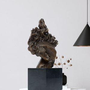 "Flames of Spirit" bronze horse head sculpture on cube marble base displayed indoors with pendant light and floral decor