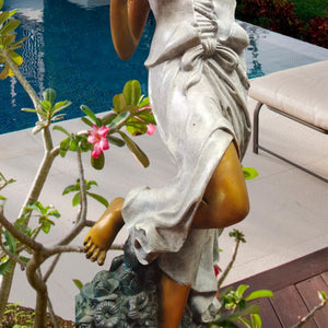 Close-up of Flora goddess bronze statue showing detailed rose accents and flowing gown polychrome sculpting