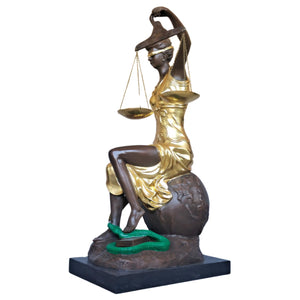 Side view of 28.3-inch gilded bronze Lady Justice Themis statue on warm brown background