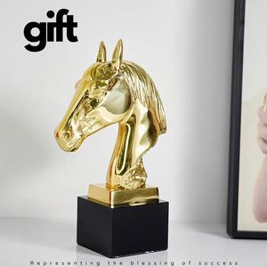 Gold brass horse head bust statue presented as luxury gift in lifestyle display setting