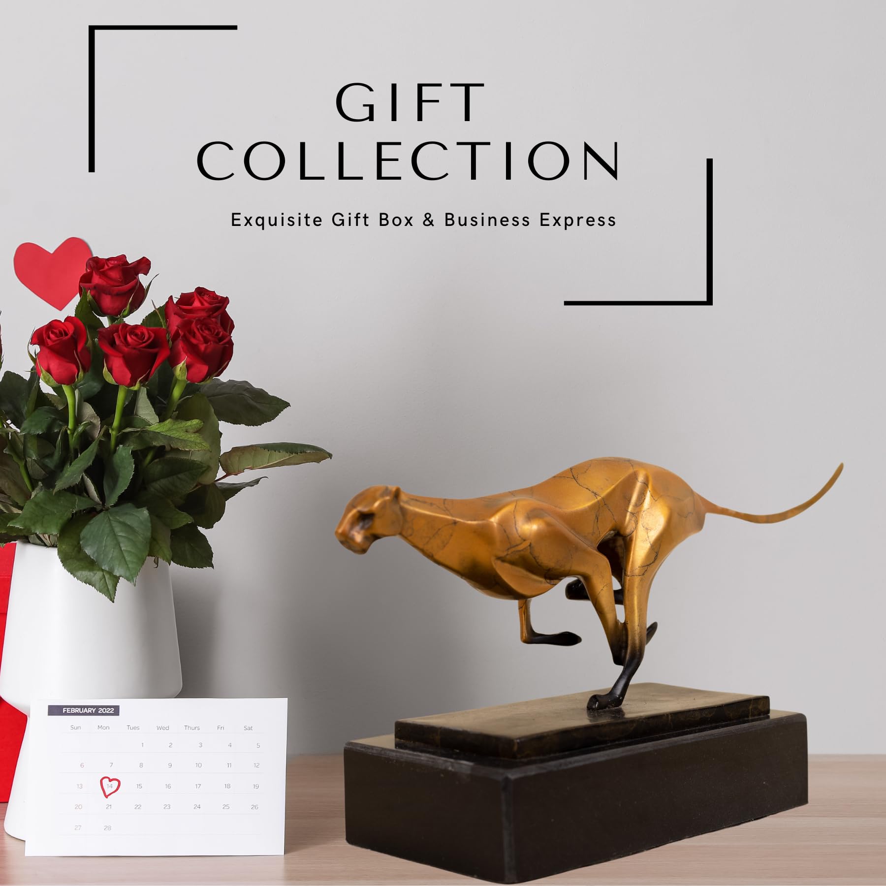 Gold running cheetah sculpture presented as gift collection with roses in lifestyle setting