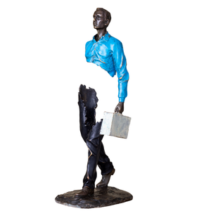 Contemporary surrealist bronze man statue with a hollowed torso design