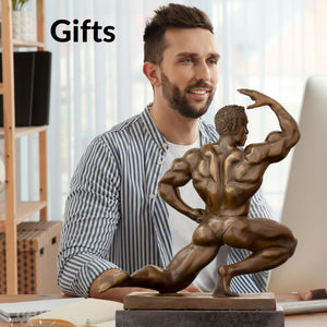 Kneeling bodybuilder bronze sculpture as gift for fitness enthusiasts displayed on office desk