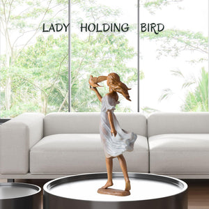 Luo Li Rong bronze lady holding bird elegant sculpture label poise elegance