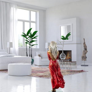 Luo Li Rong silk dancer bronze statue red dress in bright white living room beside fireplace