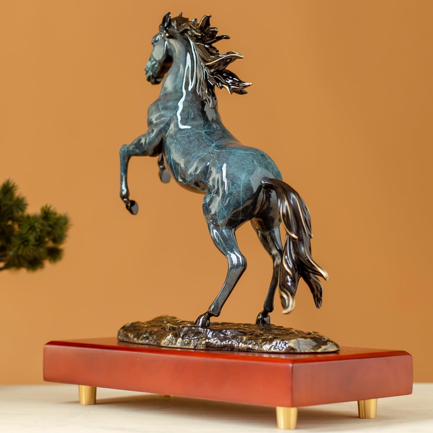 Second angle view of azure blue rearing horse bronze sculpture showing dynamic pose