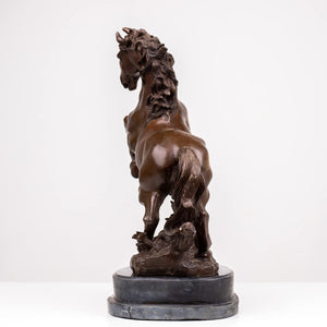 Back view of antique brown bronze rearing stallion sculpture showing tail and mane detail