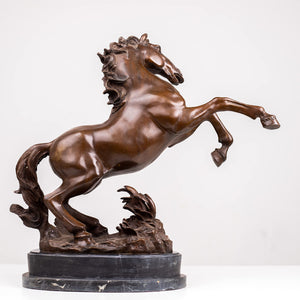 Antique brown bronze rearing stallion sculpture front angle view showing detailed mane and base