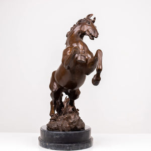 Second side view of antique brown bronze rearing stallion sculpture on marble base