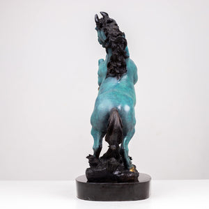 Back view of azure blue bronze rearing stallion sculpture showing flowing mane and tail