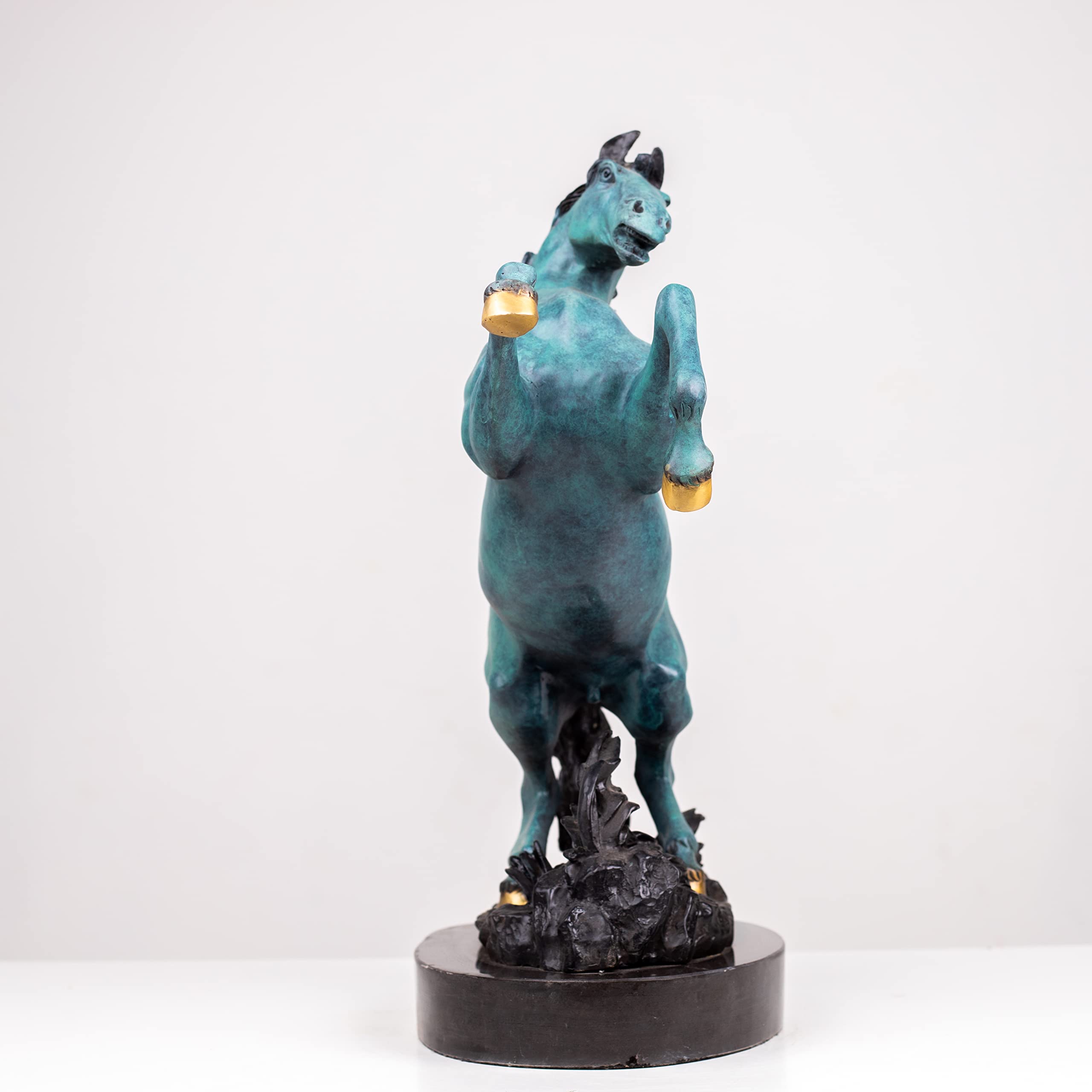 Azure blue bronze rearing stallion sculpture side full body view on marble base