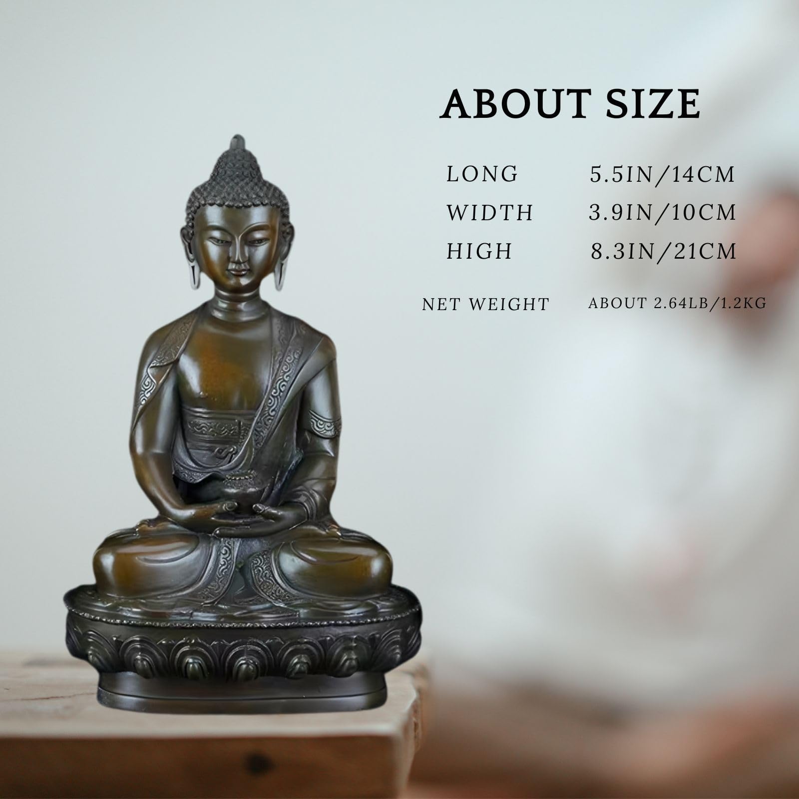 Medicine Buddha copper statue front view on light background showing lotus seat and robe detail