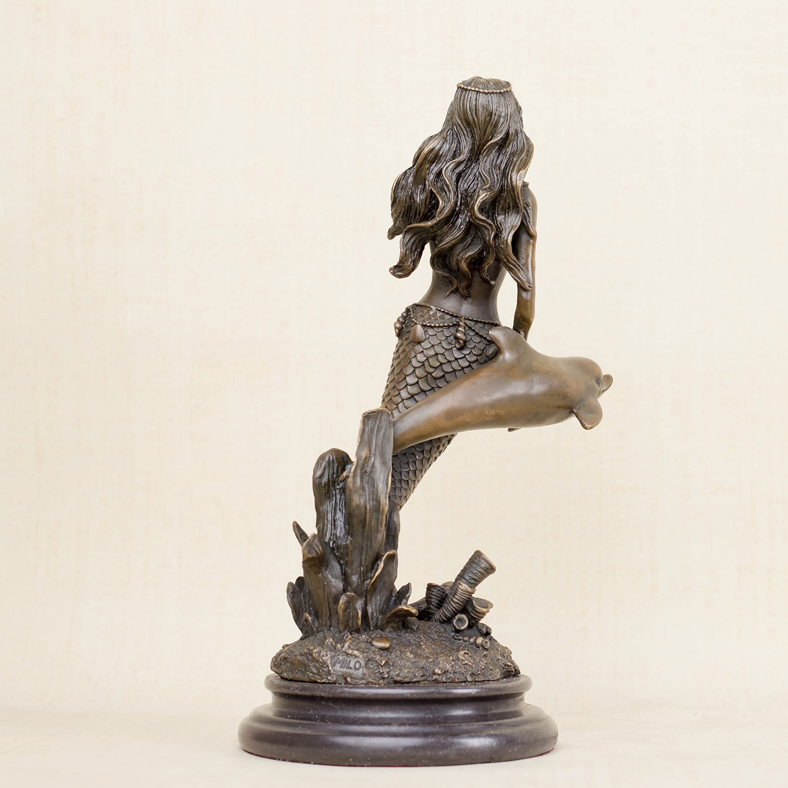Mermaid and dolphin bronze sculpture side right profile full body view