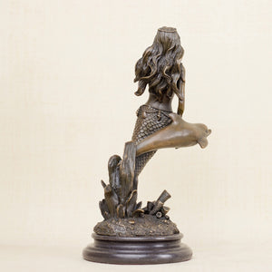 Mermaid and dolphin bronze sculpture side right profile full body view