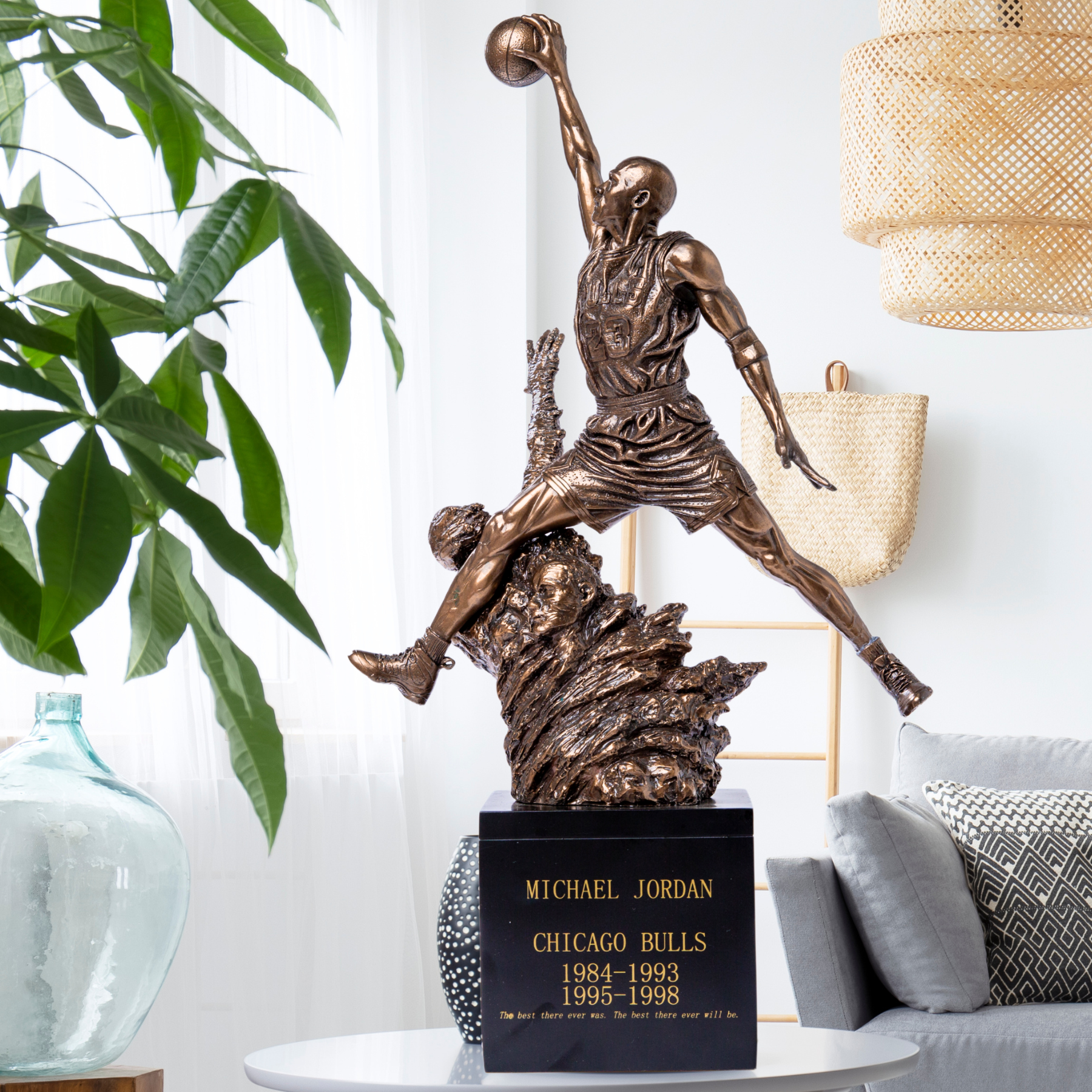 20-inch Michael Jordan flying dunk statue matte bronze finish, full view on black base