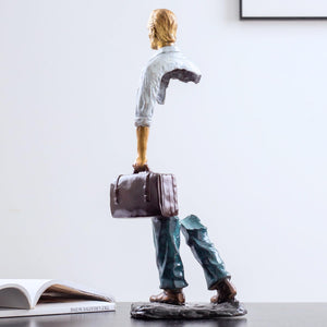 Celestial gray standing voyageur bronze statue styled in a modern luxury living room.
