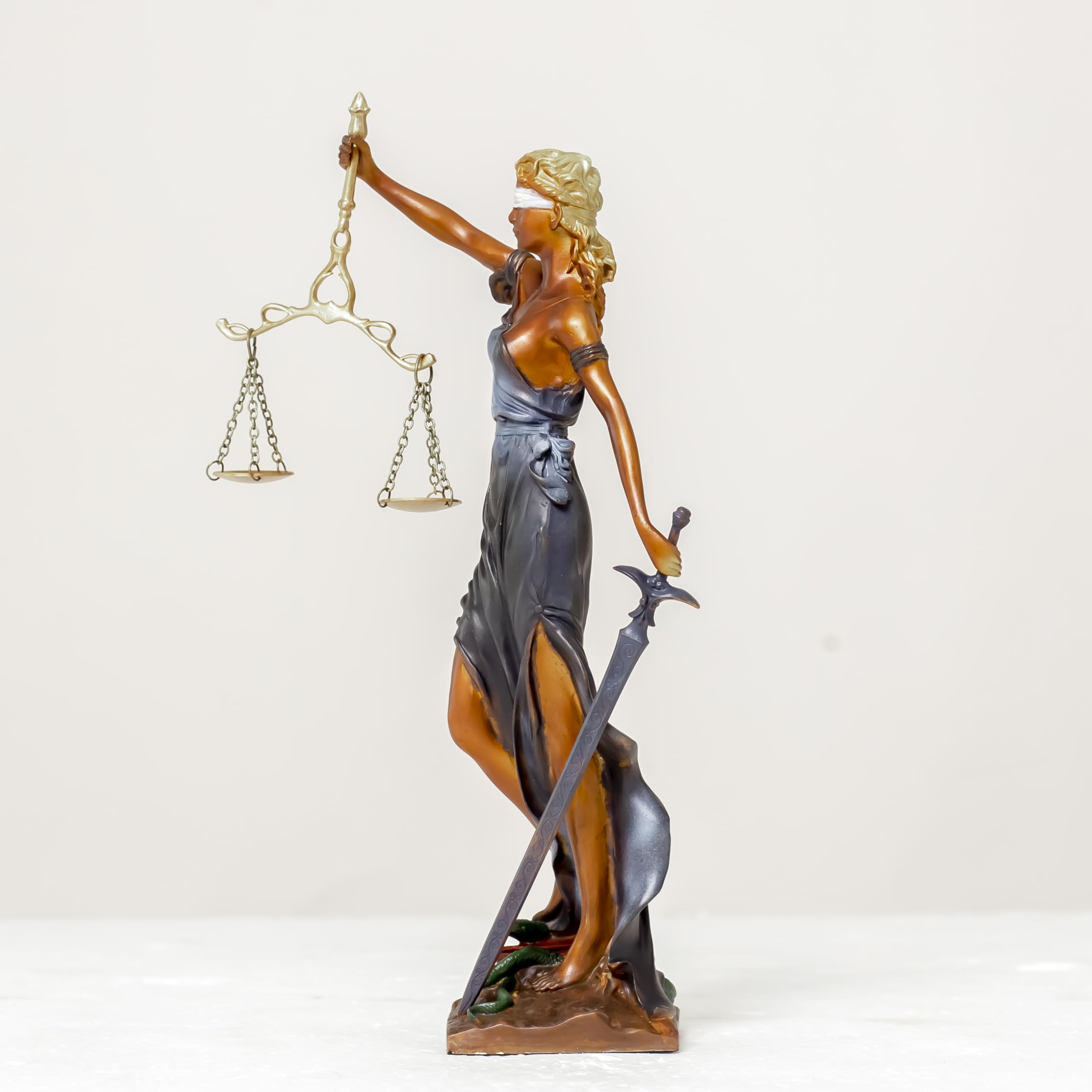 Multicolor Lady Justice Themis statue standing front view on white background with scales raised