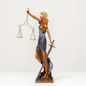 Multicolor Lady Justice Themis statue standing front view on white background with scales raised