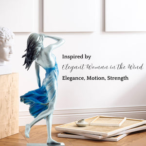 Neoclassical bronze wind dancer blue dress elegant pose ocean backdrop