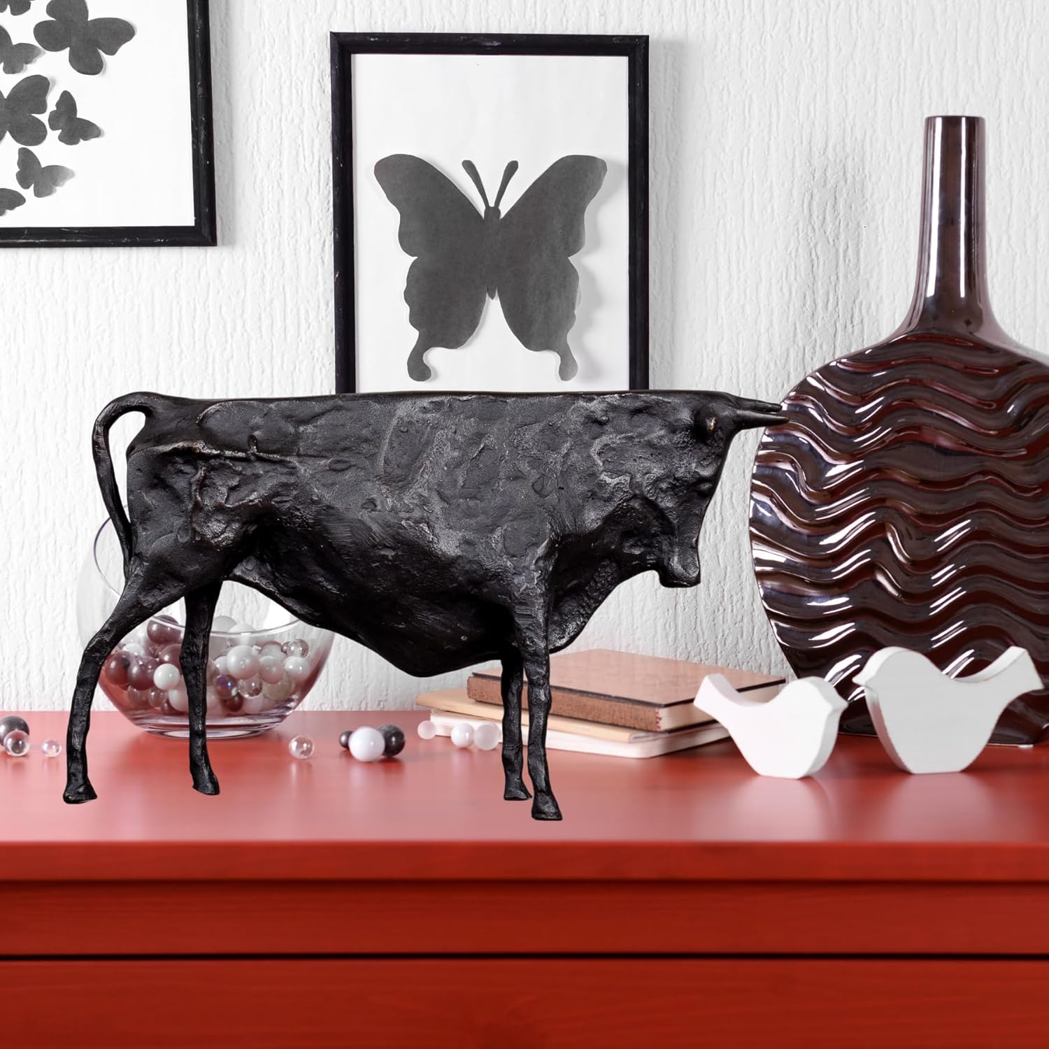 Small black abstract Picasso-inspired bull sculpture.