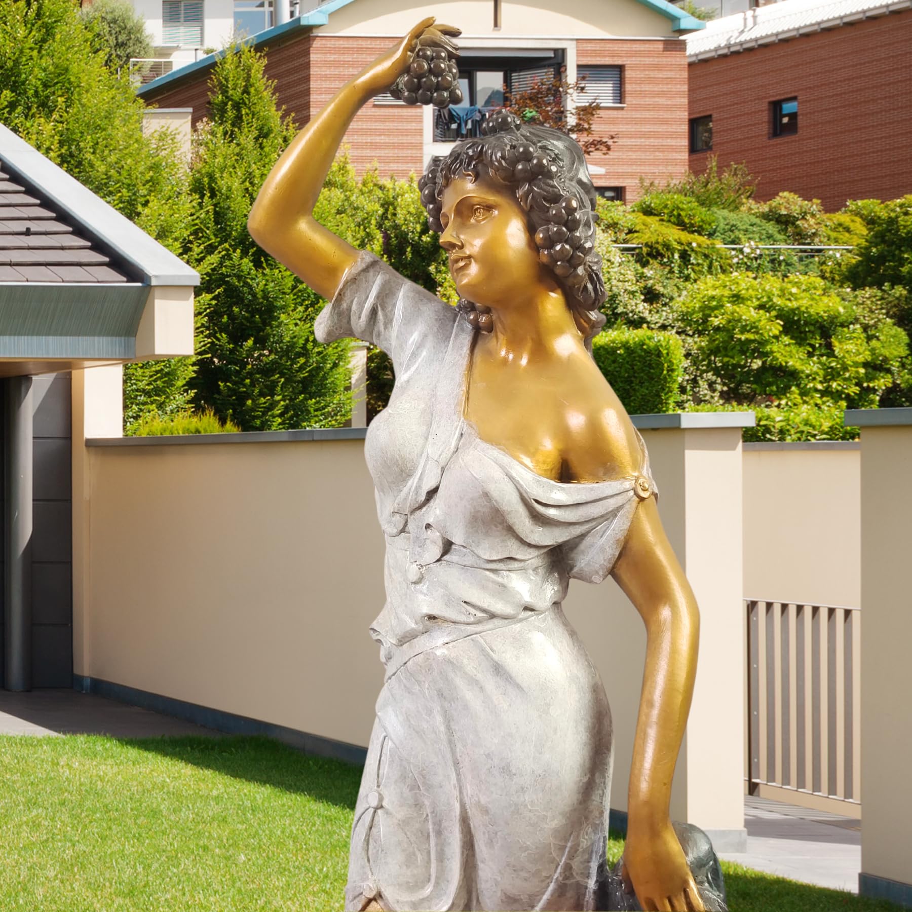 Pomona goddess bronze statue displayed beside pool with ocean view as luxury outdoor mythology art