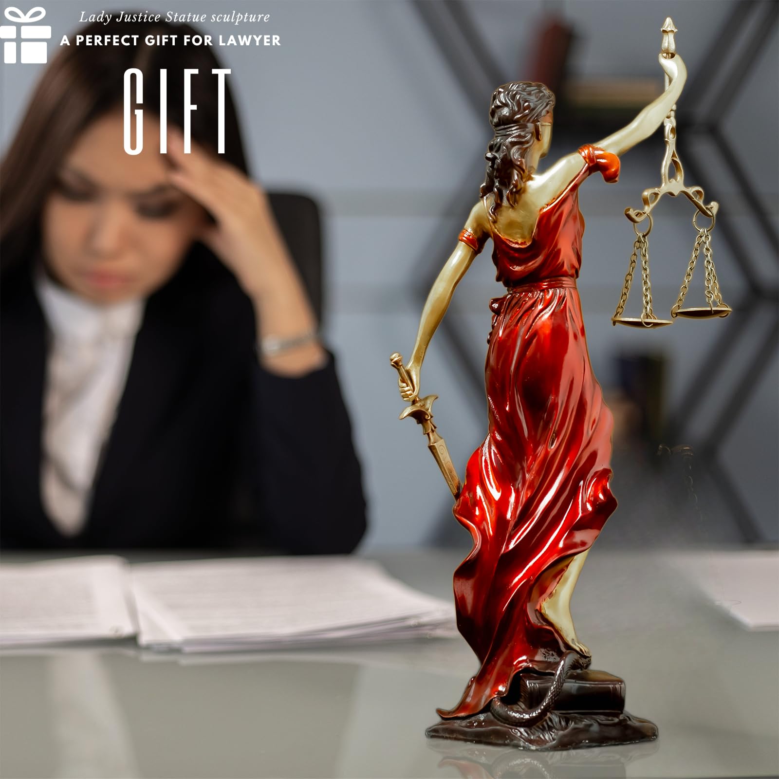 Red Lady Justice Themis statue in female lawyer office lifestyle setting as ideal legal gift