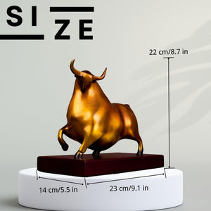 Side profile of the reddish-orange charging bull figurine.