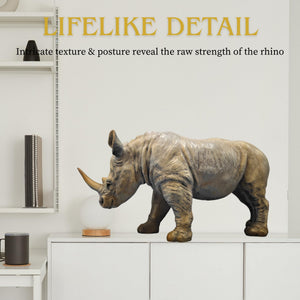 Realistic gray bronze rhino statue, side view profile.