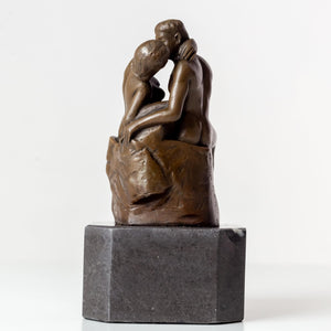 Rodin The Kiss bronze statue right three-quarter angle view on white background with black base