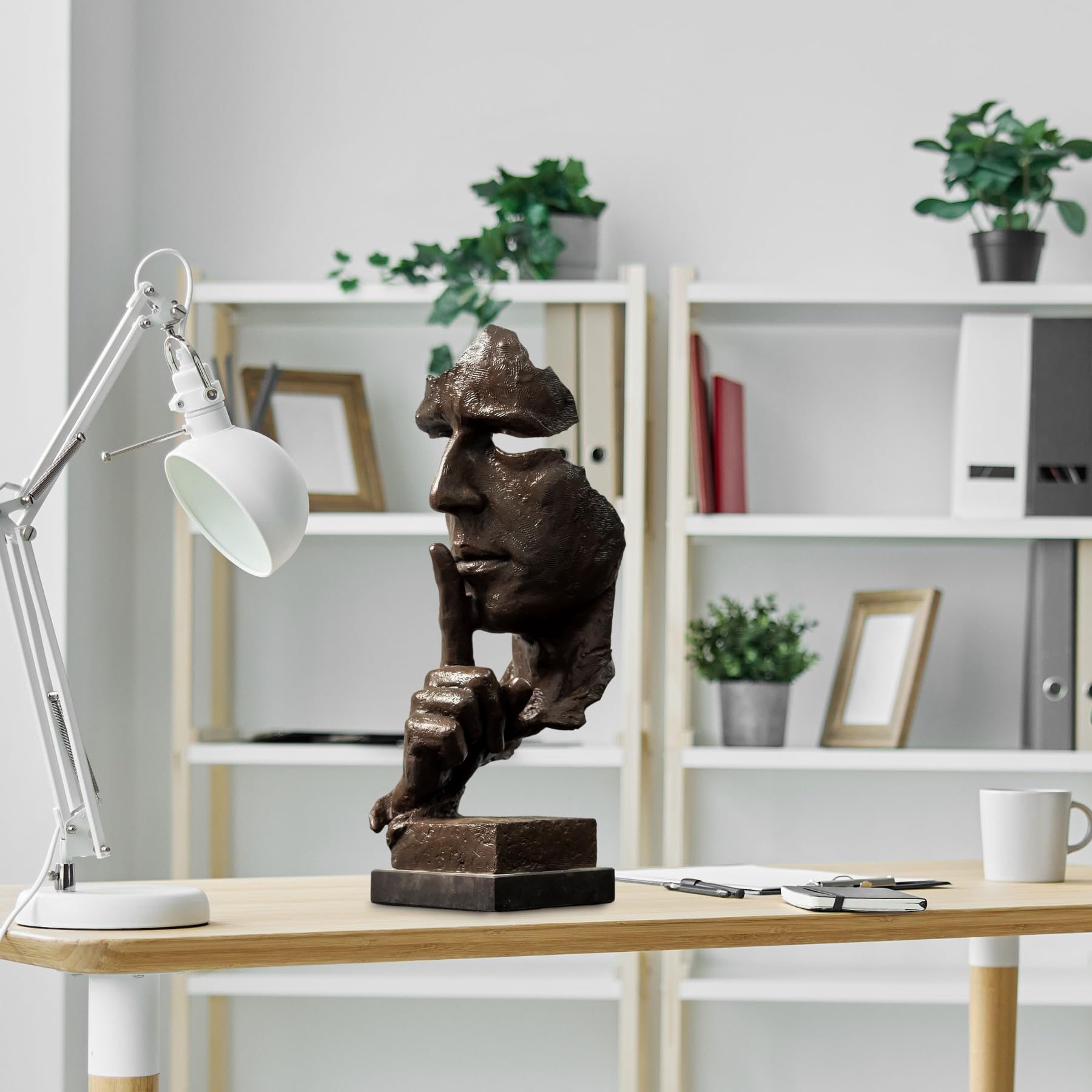 Black Silence is Gold thinker bronze figurine displayed on office bookshelf décor