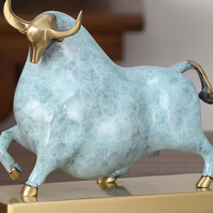 Artistic sky blue bull sculpture for sophisticated home and office decor.