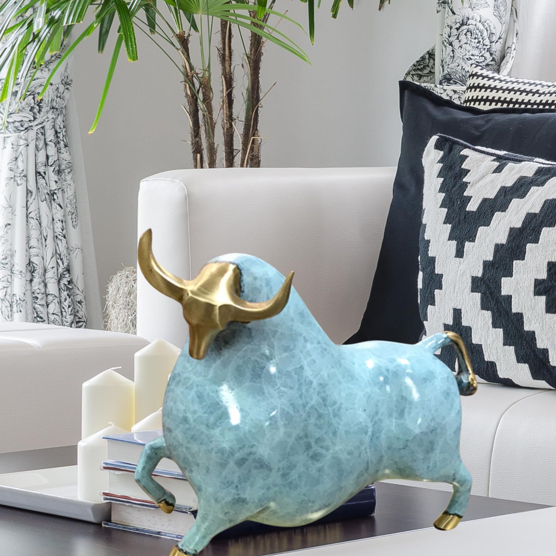 Detailed view of the premium solid brass base of the enamel bull.