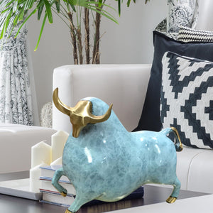 Detailed view of the premium solid brass base of the enamel bull.