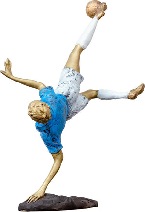 Low angle front view of soccer player overhead kick statue highlighting dynamic movement