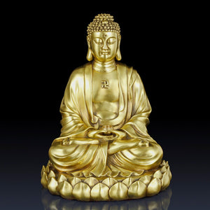 Solid brass Buddha statue on dark background highlighting gold finish and craftsmanship detail