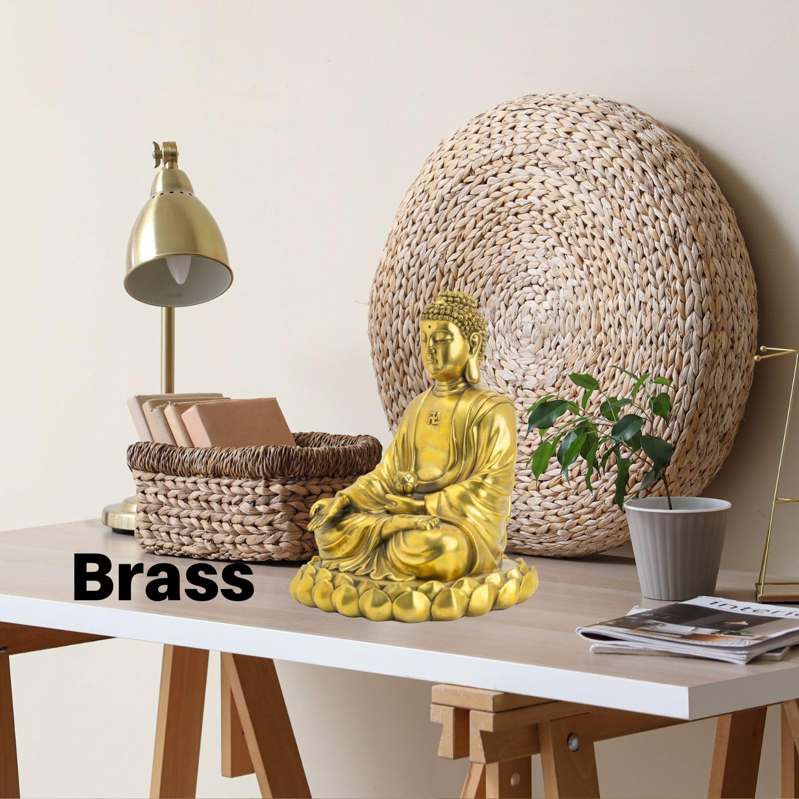 Solid brass Buddha statue on desk as decorative accent, brass material label shown