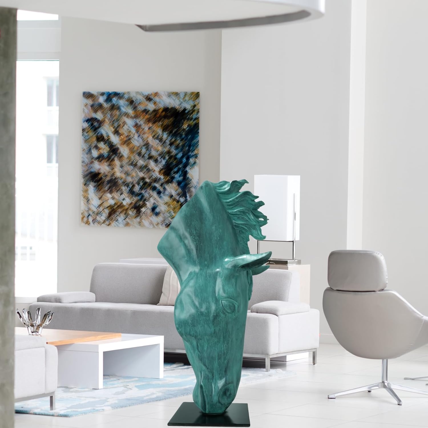 Still Water horse head bronze sculpture emerald patina displayed in modern living room beside wall art