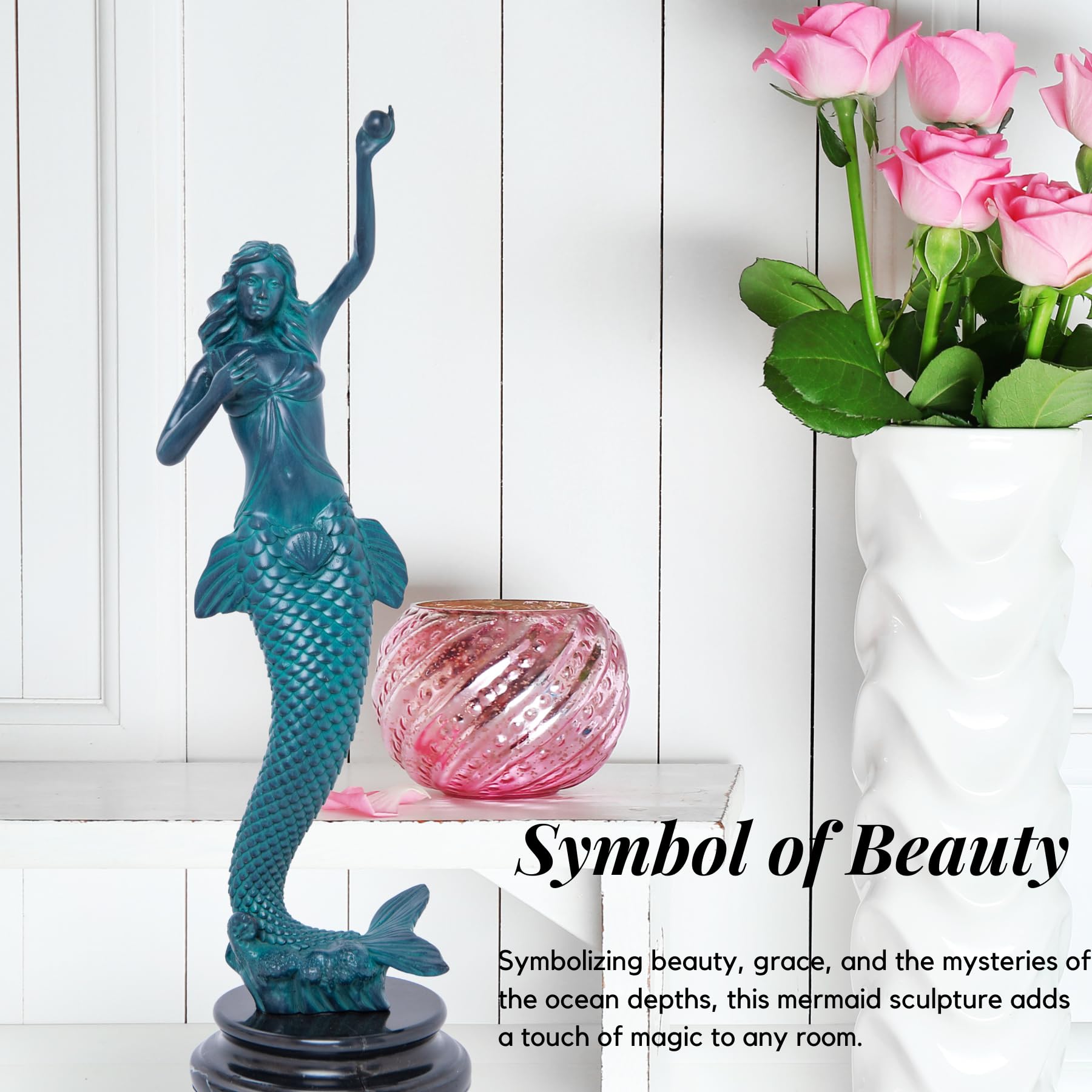 19.7 inch teal blue bronze mermaid sculpture symbol of beauty displayed beside pink roses