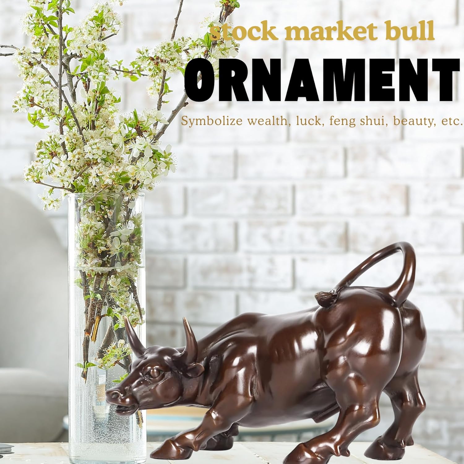 Classic brown brass bull decor styled on a wooden home office desk.