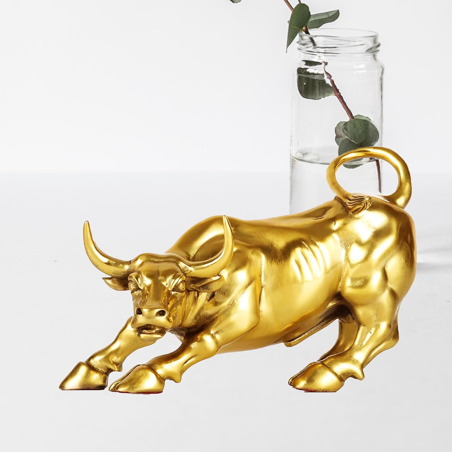 Unique gold brass charging bull on desk